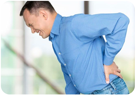 Back Pain Chiropractor Gaithersburg, MD - white man in blue shirt hand on back pain